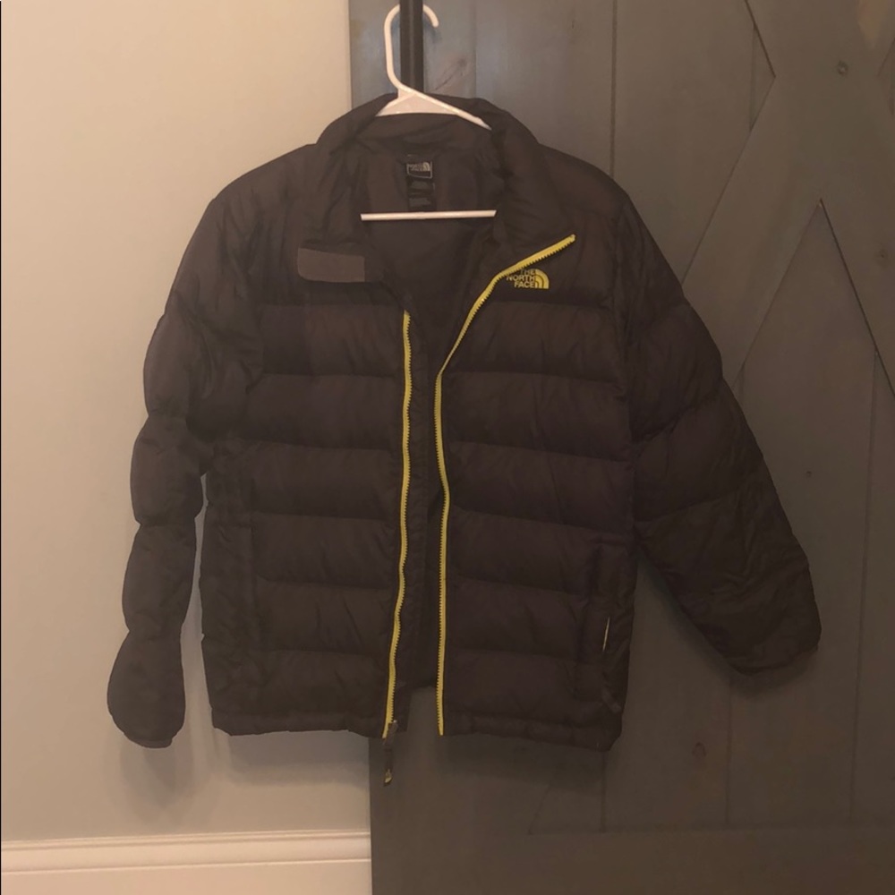 Boys black winter puff jacket.